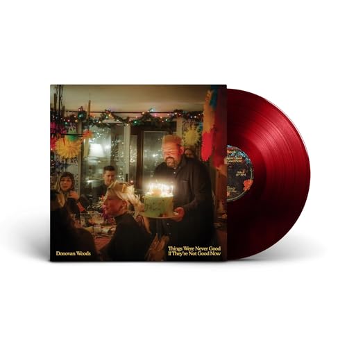 Donovan Woods vinyl record cover showing a man with a birthday cake and disc.