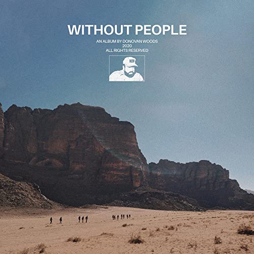Album cover for Donovan Woods’ “Without People” featuring desert landscape.