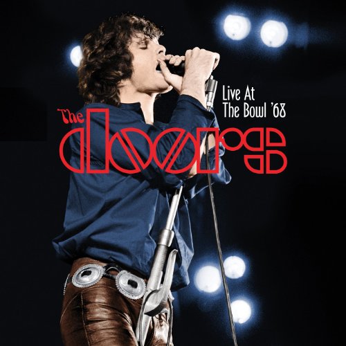 Jim Morrison singing into a microphone, album cover for The Doors live album.
