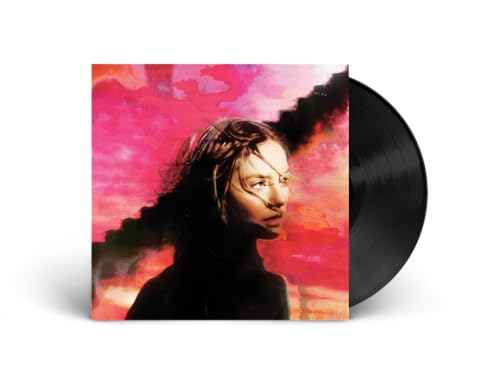 Vinyl record with album cover featuring a woman’s face in pink smoke.