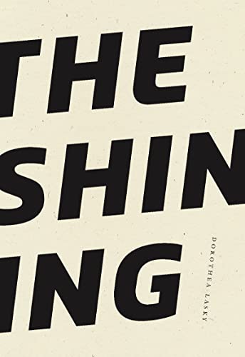 Book cover with bold, black text reading "The Shining" on a cream background.