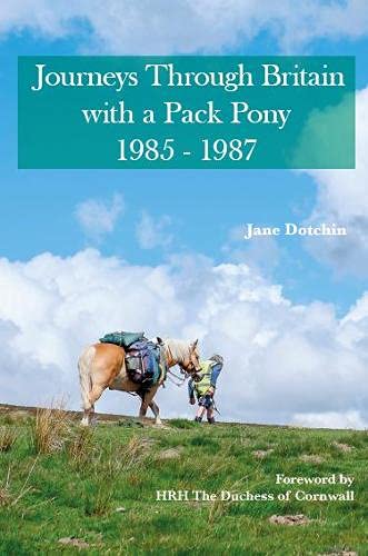 A person walking with a pack pony across a grassy hill under a blue sky.