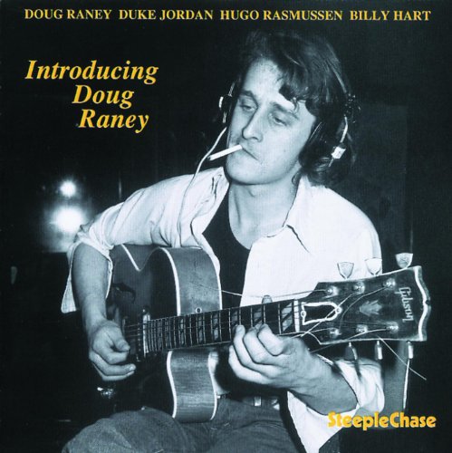 Black and white photo of jazz guitarist Doug Raney playing guitar.