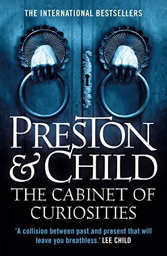 Book cover: ornate door handles on a dark blue wooden door.