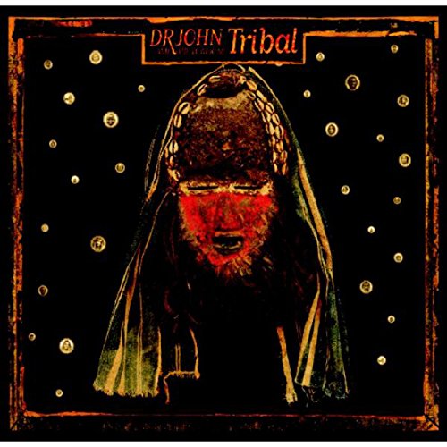 Album cover with a bearded man in a hooded cloak against a dark background.