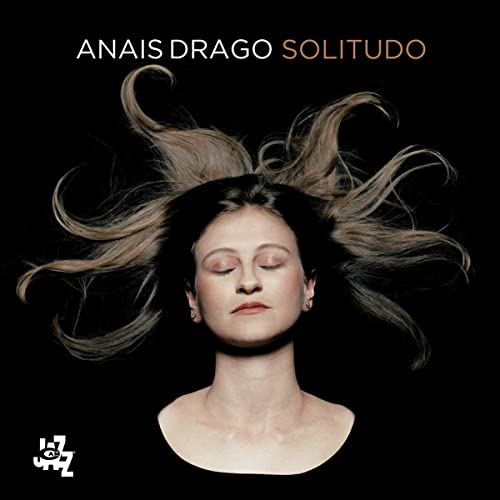 CD cover: Woman with eyes closed, surrounded by flowing hair.