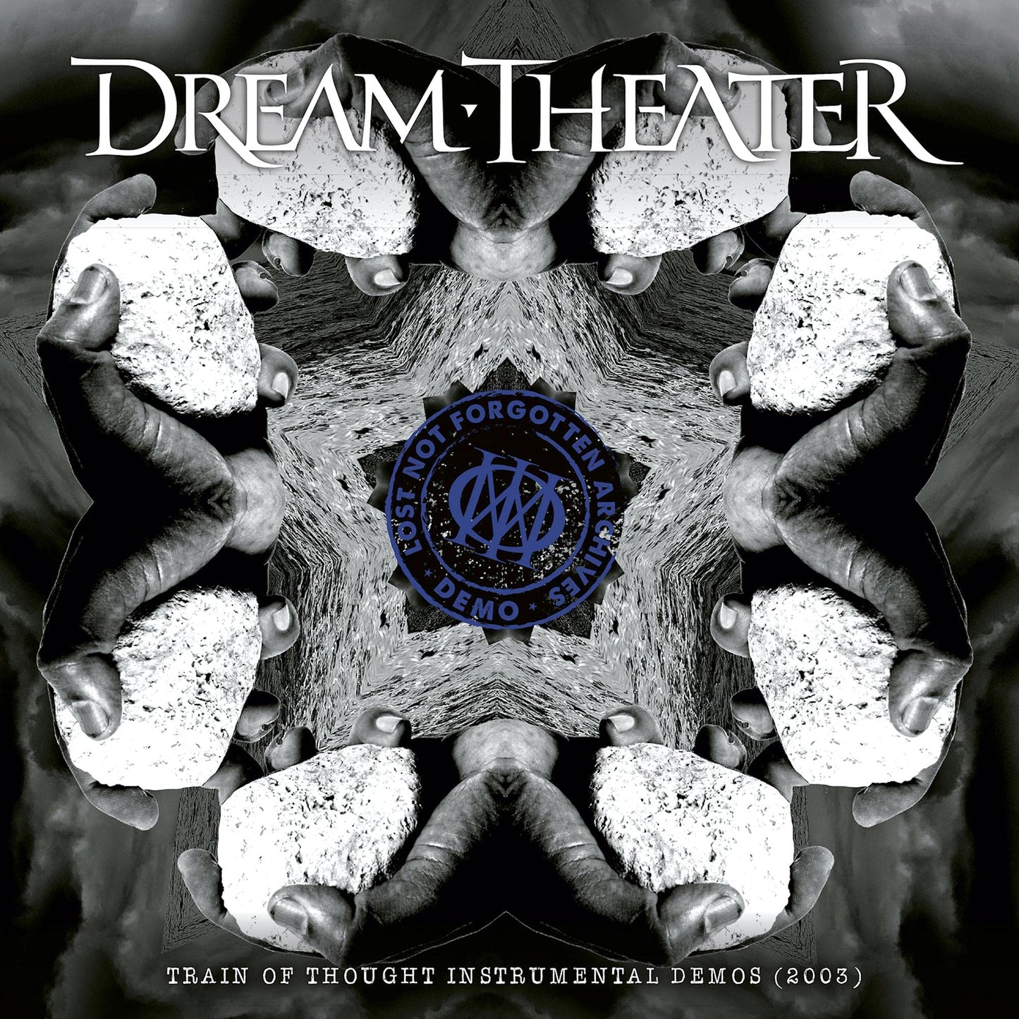 Dream Theater album cover: symmetrical hands surrounding a blue logo.