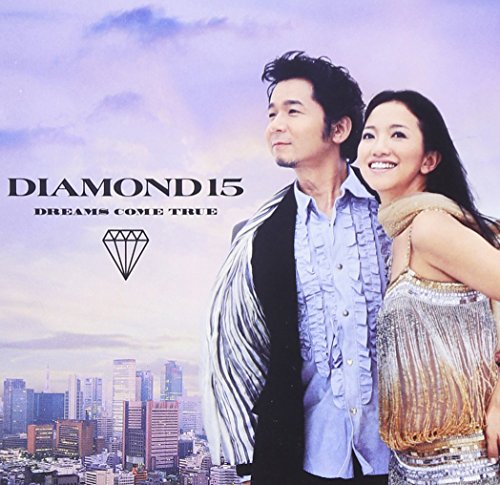 A man and woman pose against a city skyline background on this CD cover.