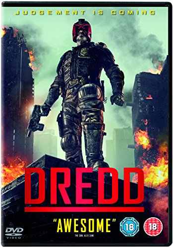 DVD cover for "Dredd" featuring a futuristic law enforcer amid flames.