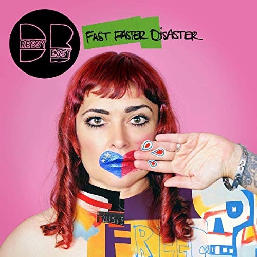 "Dressy Bessy album cover featuring a woman with red hair and painted lips."