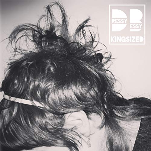 Album cover for Dressy Bessy’s “Kingsized” featuring messy hair and text.