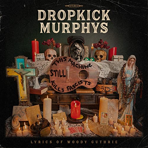 Dropkick Murphys album cover with guitar, skulls, candles, and religious imagery.