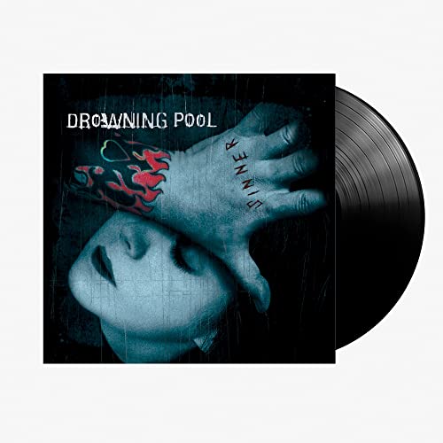 Drowning Pool “Sinner” vinyl record with album art of a hand and face.