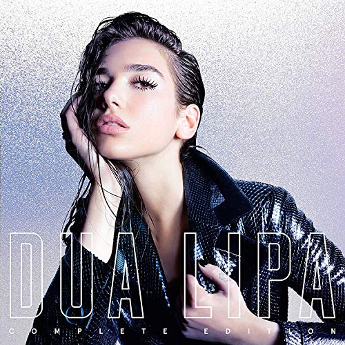 "Dua Lipa album cover with a woman in a shiny jacket against a grey background."