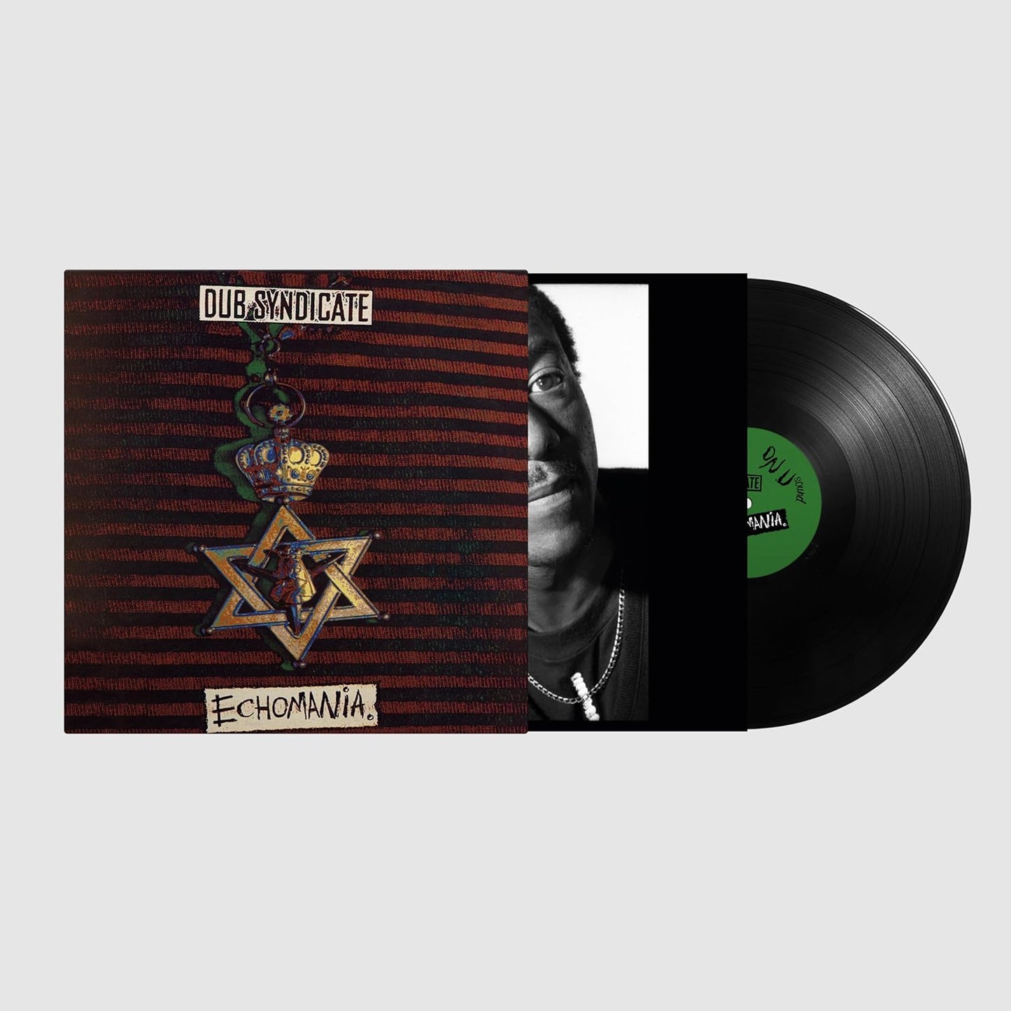 Vinyl record and cover art for Dub Syndicate Echomania featuring a star pendant.