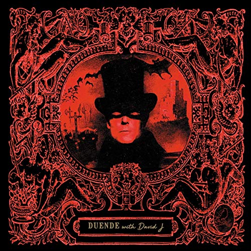 Red ornate frame around a portrait of a man in a top hat.