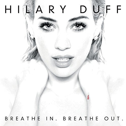 Hilary Duff album cover, "Breathe In Breathe Out," black and white portrait.
