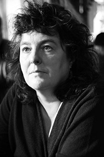 Black and white portrait of a woman with curly hair.