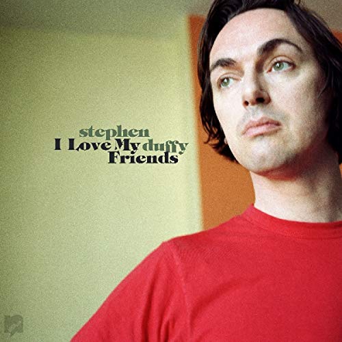 Album cover featuring a man in a red shirt against a pale green and orange background.