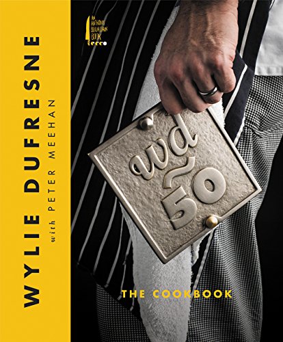 Cookbook cover with metal tray reading "wd~50" and chef's jacket.