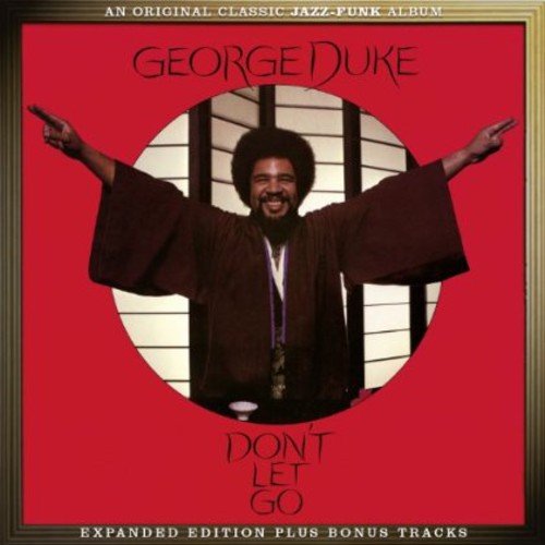 George Duke album cover: red background, Duke pointing with arms outstretched.