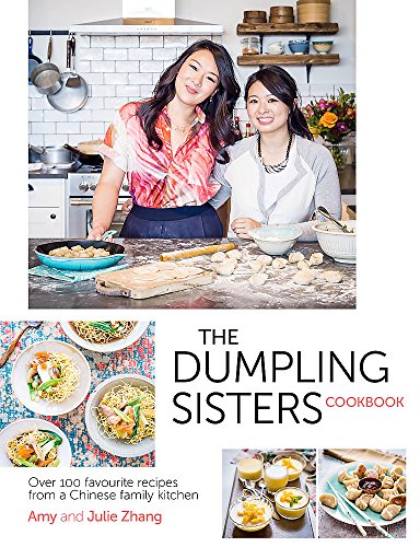Cookbook cover featuring two smiling women in a kitchen with dumplings.