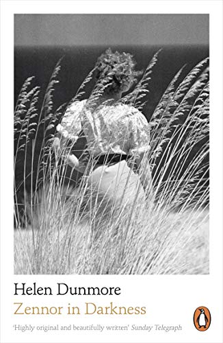 Black and white book cover showing a woman standing in tall grass near water.