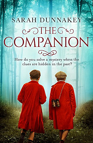 Book cover: two boys in red coats walk into a misty forest.
