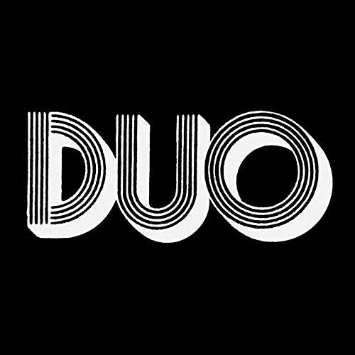The image shows the word "DUO" in white on a black background. An appropriate alt text for this image is: "White 'DUO' text with striped pattern on a black background."