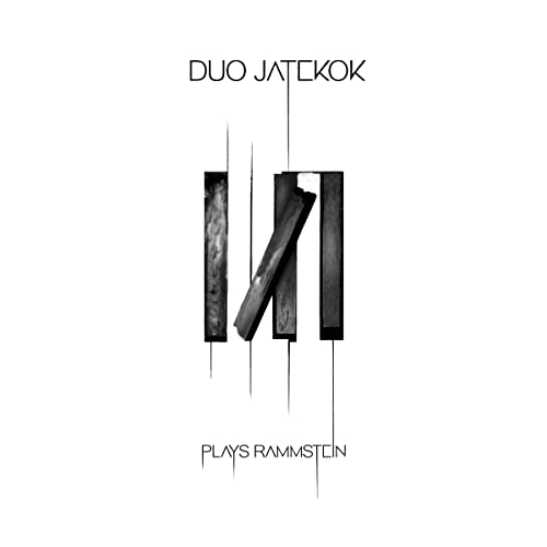 Duo Jatekok album cover with abstract, dark wood-like shapes.