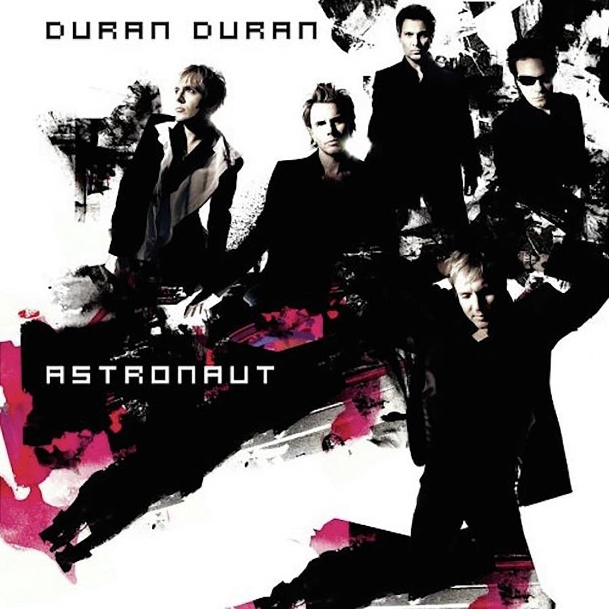 "Duran Duran band members in black attire on Astronaut album cover with pink accents."
