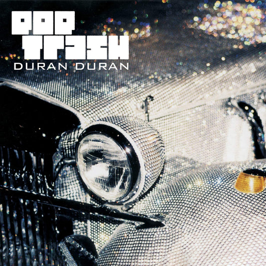 Album cover for "Pop Trash" by Duran Duran, featuring a rhinestone-covered vintage car.