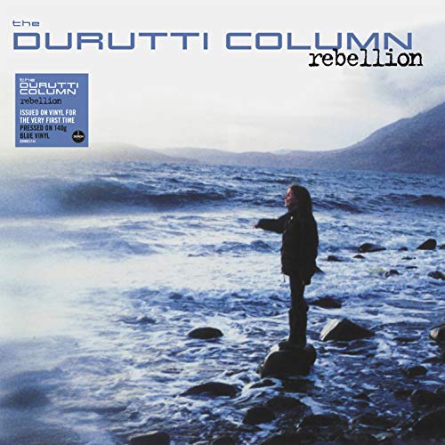 Album cover for Durutti Column’s “Rebellion” featuring a lone figure by the sea.