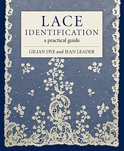 Book cover with white lace patterns on a blue background and title text.