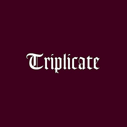 Bob Dylan’s “Triplicate” album cover: ornate white script on dark red.