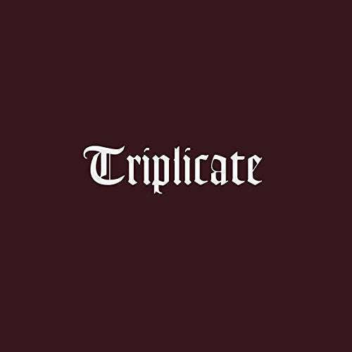 Dark maroon album cover with ornate white lettering spelling "Triplicate".