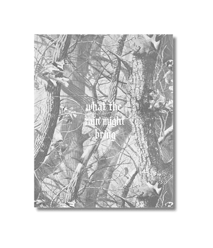 Black and white book cover with tangled trees and title text.