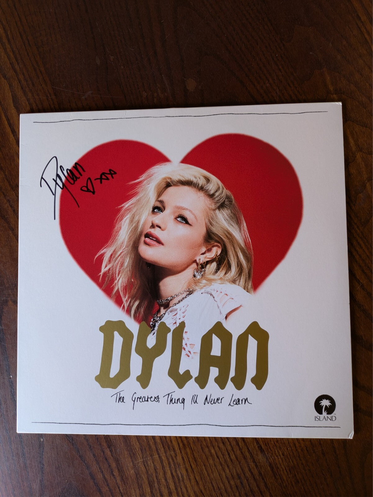 Vinyl record cover featuring a blonde woman inside a red heart.