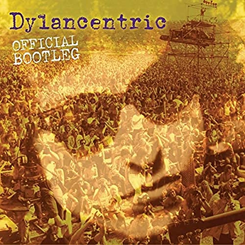 CD cover with a large crowd scene and a tower-like structure.