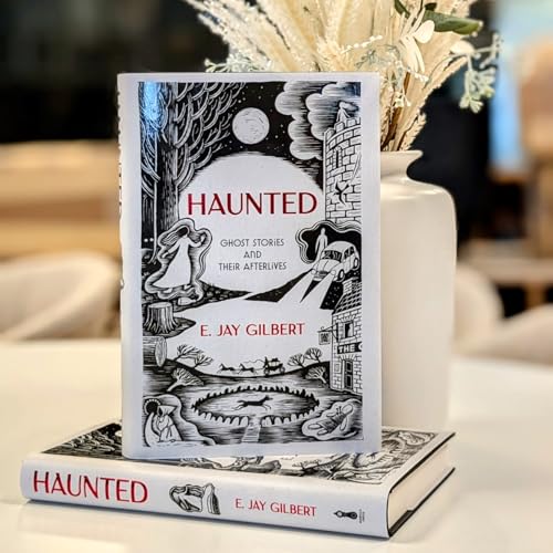 Book cover: “Haunted” by E. Jay Gilbert, with ghostly illustration.