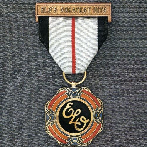 CD case resembling a medal with "ELO" logo and ornate design.