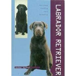 Book cover featuring two Labrador Retrievers, one black, one brown.