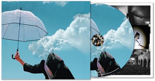 CD cover with a person holding an umbrella against a cloudy sky.