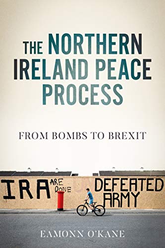 Book cover: "The Northern Ireland Peace Process" with mural background.