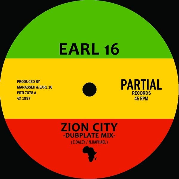 Vinyl record label with green, yellow, and red concentric bands and black center.
