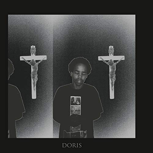 Black and white album cover featuring Earl Sweatshirt standing between two crucifixes.