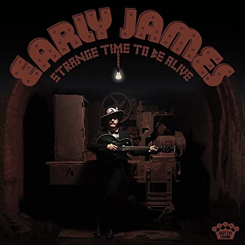 Album cover for Early James’ “Strange Time To Be Alive” with a musician.