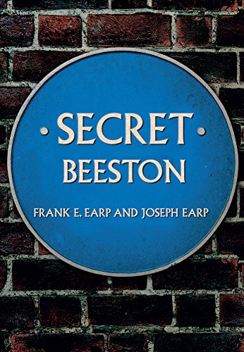Blue plaque reading "Secret Beeston" against a red brick wall.