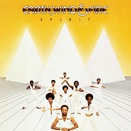Earth, Wind & Fire album cover with band members and white triangles.