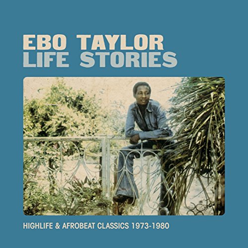 Ebo Taylor album cover: man leaning on a metal gate, outdoors.